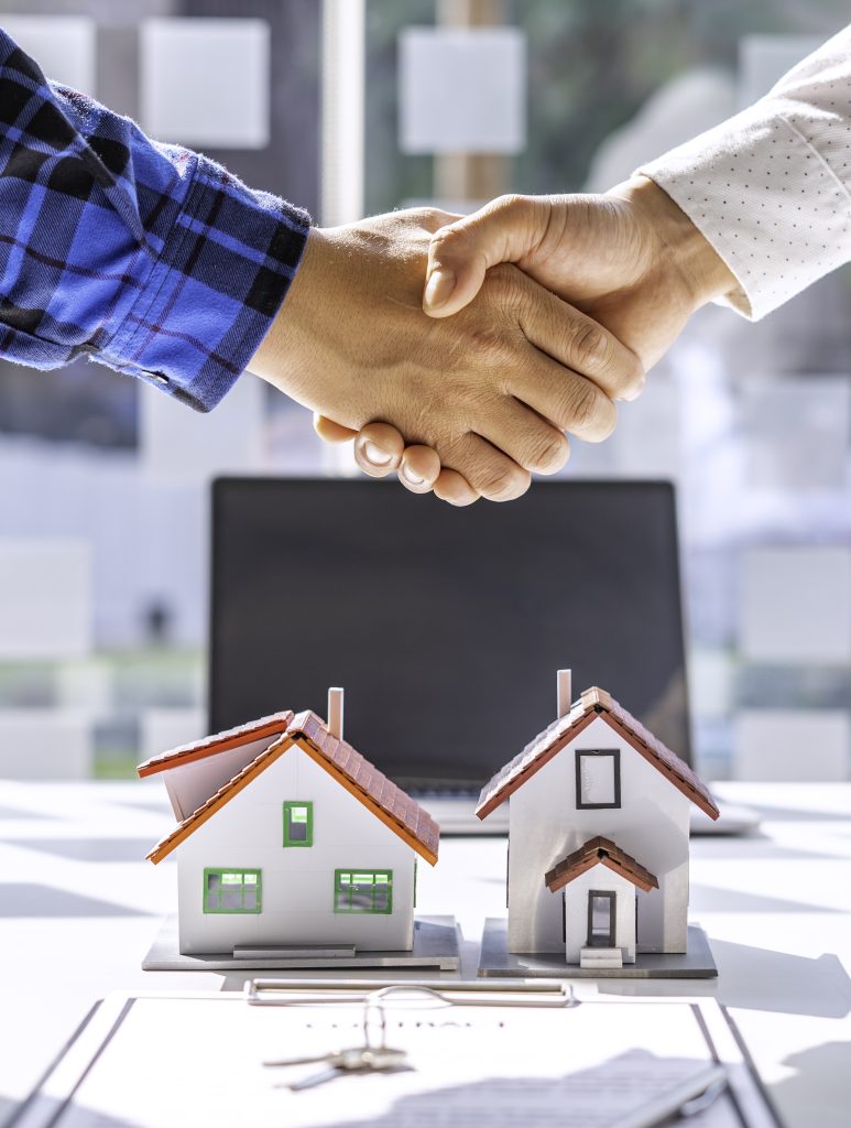 real-estate-agents-and-clients-shake-hands-and-del-2025-02-18-06-16-45-utc